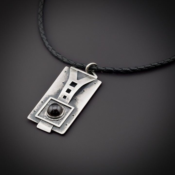 The Dark Star - Sterling Silver Star Garnet Pendant | Hand-Forged Jewelry