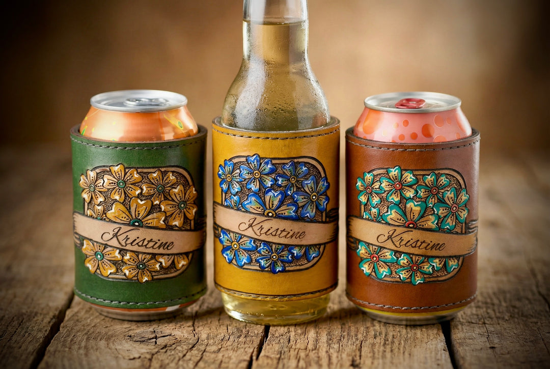 Three beer bottles with decorative leather sleeves on a wooden surface