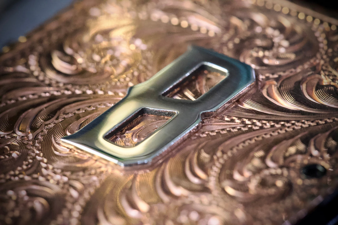 Hand engraved copper wallet with sterling silver monogram